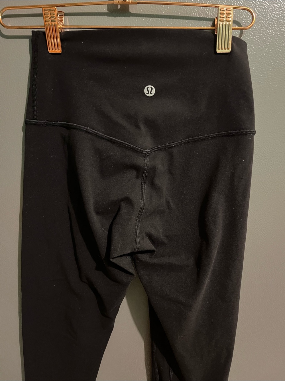 Lululemon legging size 2 was sewed on the bottom leg but doesn’t affect